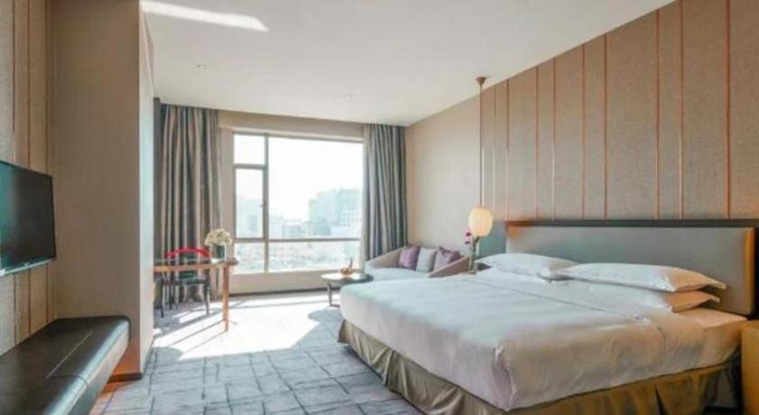 Maison New Century Hotel Dongguan Tung-kuan Exteriér fotografie